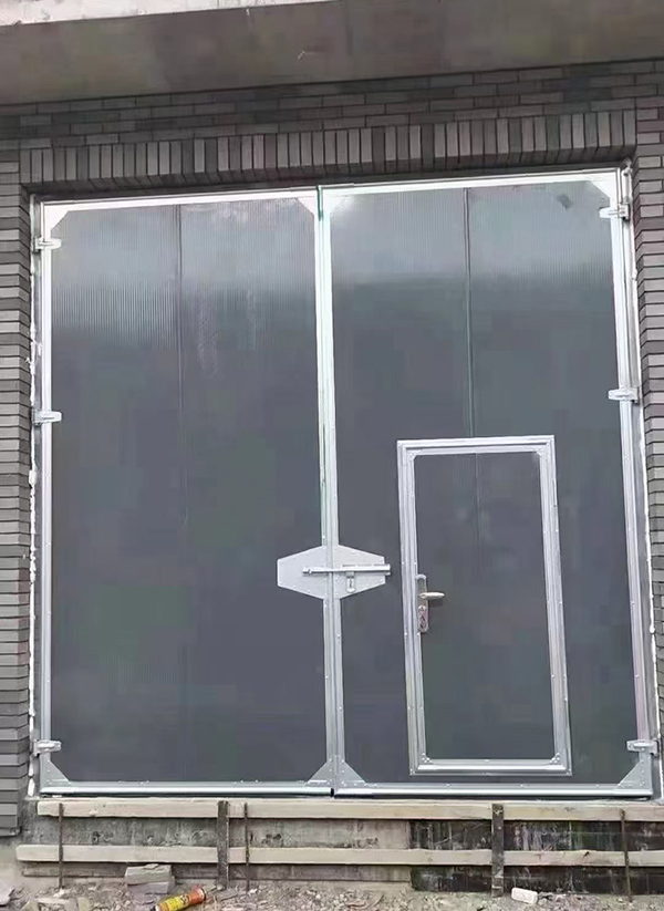 定西工业平开门在大型设备制造车间的应用实例